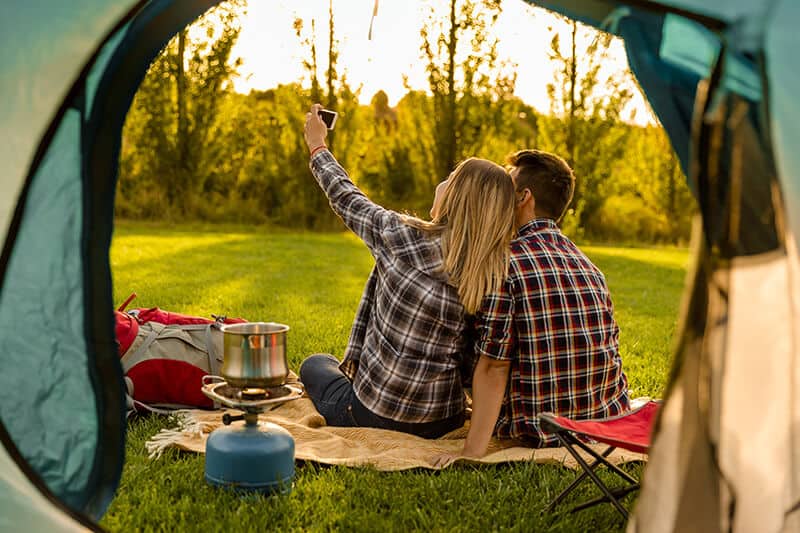 Couple Camping and taking a selfie near the Devil's Tower National Monument