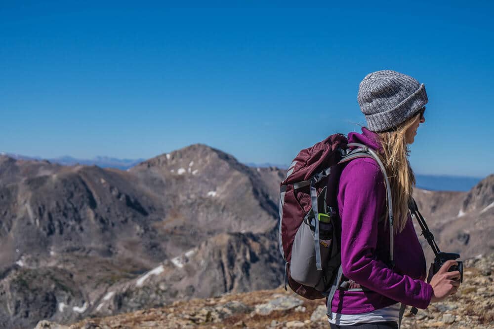 Woman hiking with a lightweight backpack