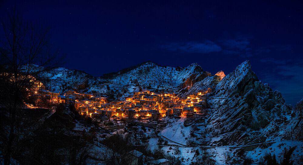 The Italian city of Castelmezzano at night in winter