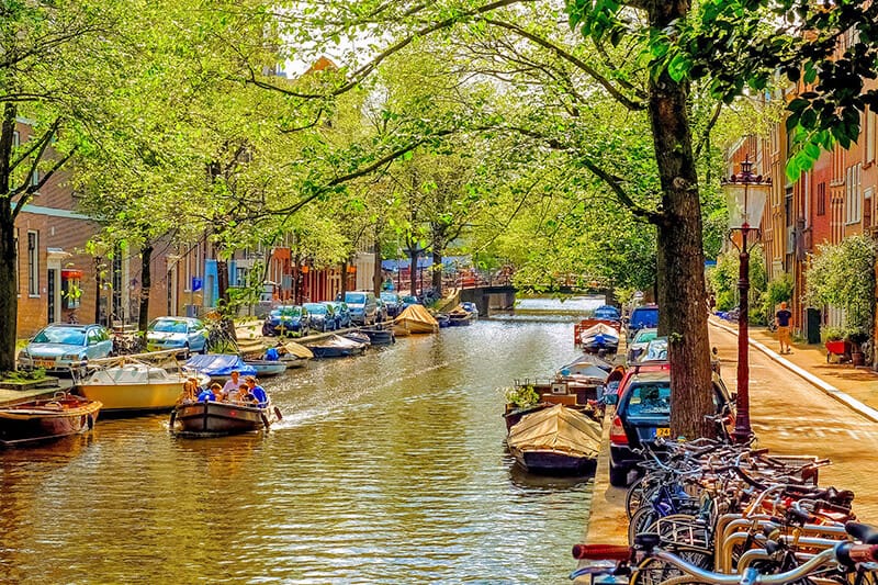 Boat travelling on a canal on a day trip from Amsterdam