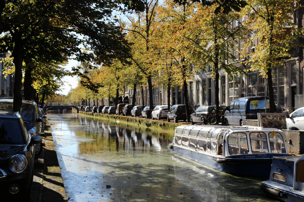 View of a canal in Amsterdam with long boats