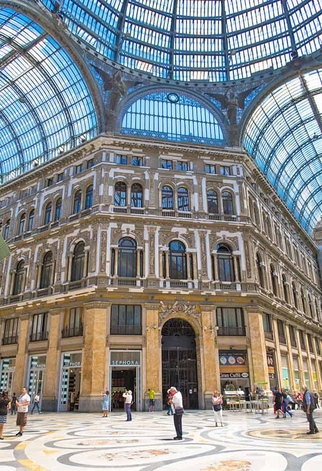 The inside of Galleria Umberto I in Naples with its glass dome and designer shops