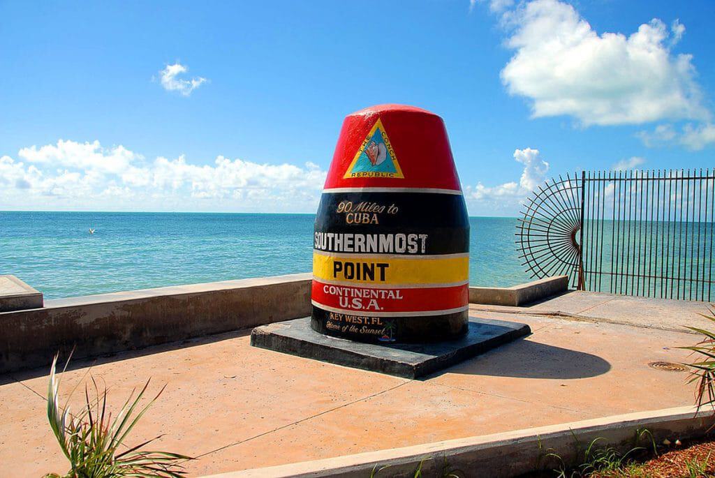 The Southernmost Point buoy in Key West on a bright summer day