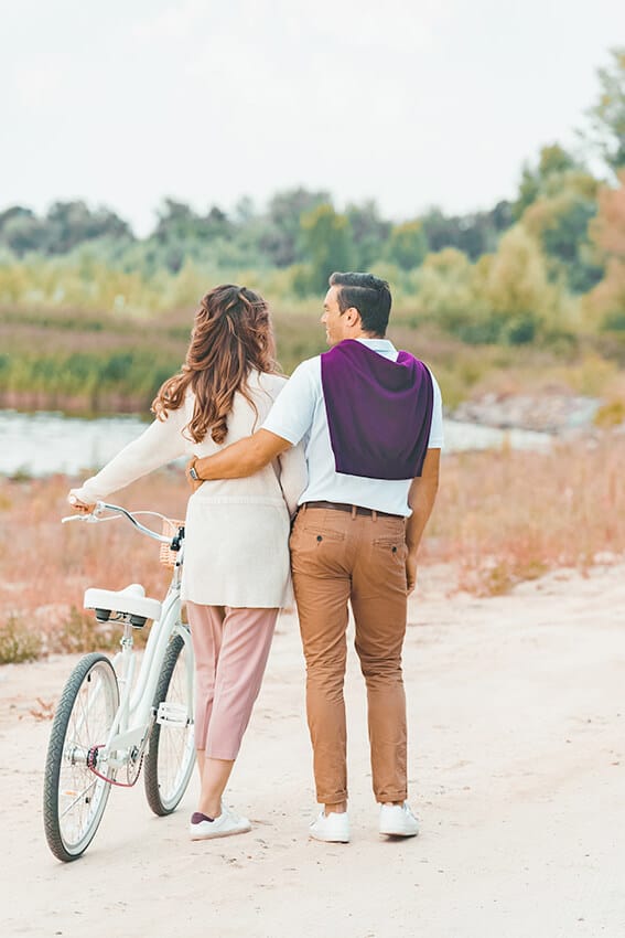 Happy Couple Cycling in Miami Beach