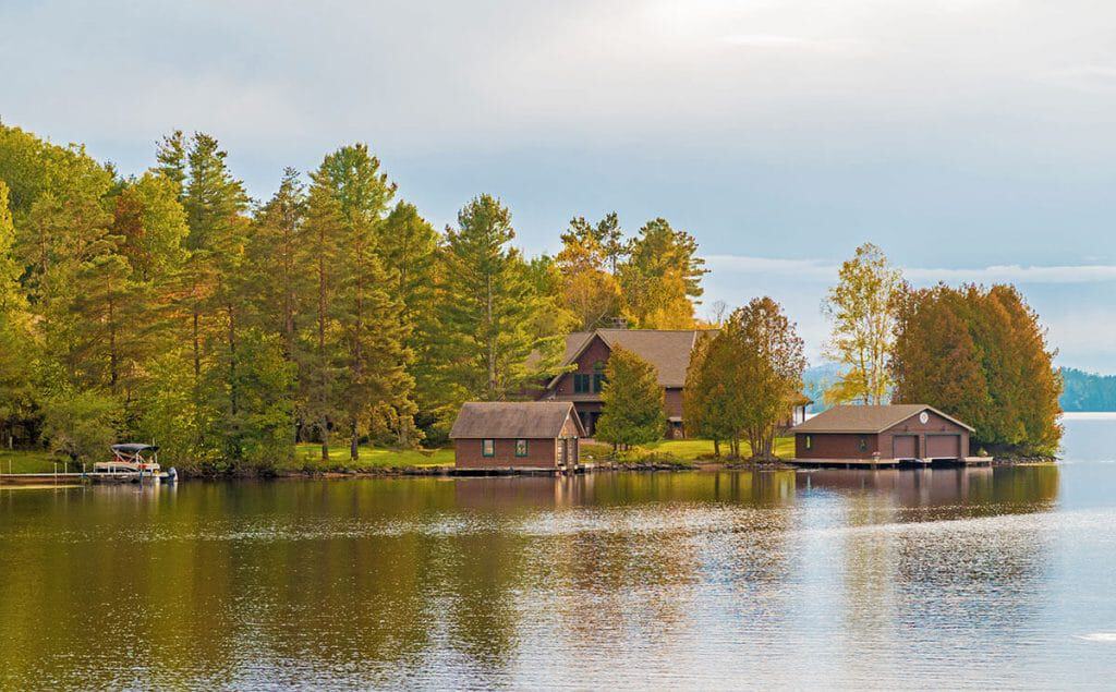 Autumn foliage in the Adirondacks - cabins on the lake