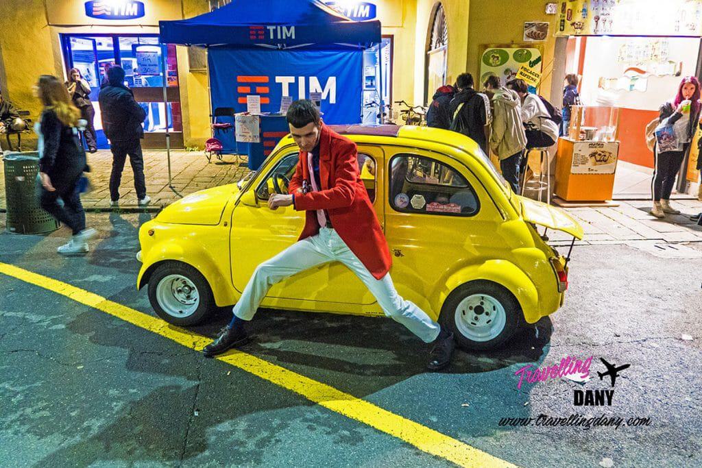 Lupin III cosplayer with a real Fiat Cinquecento on its back