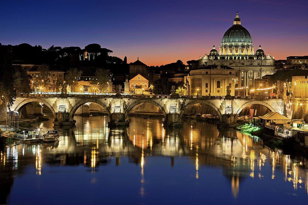 Romantic view of Ponte Umberto I in Rome at night