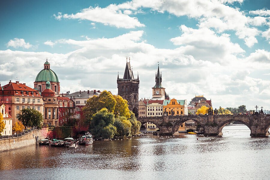 Where to stay in Prague  | View of the Vlatava river, Charles Bridge and Old town Prague in Autumn