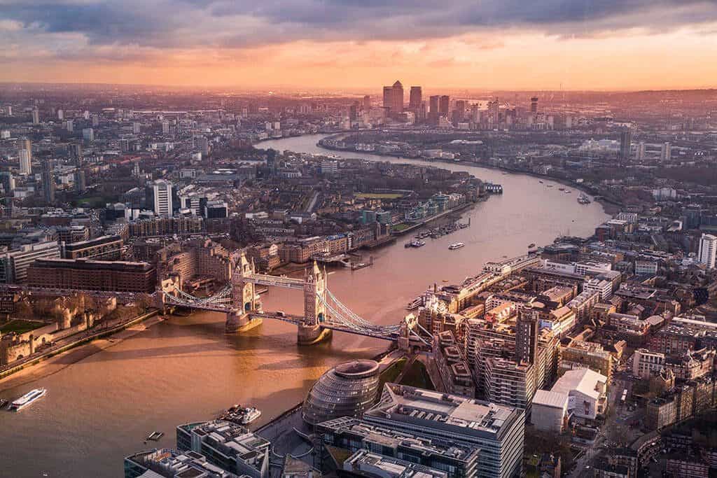Aerial view of London at Sunset, with Thames and the beautiful Tower Bridge
