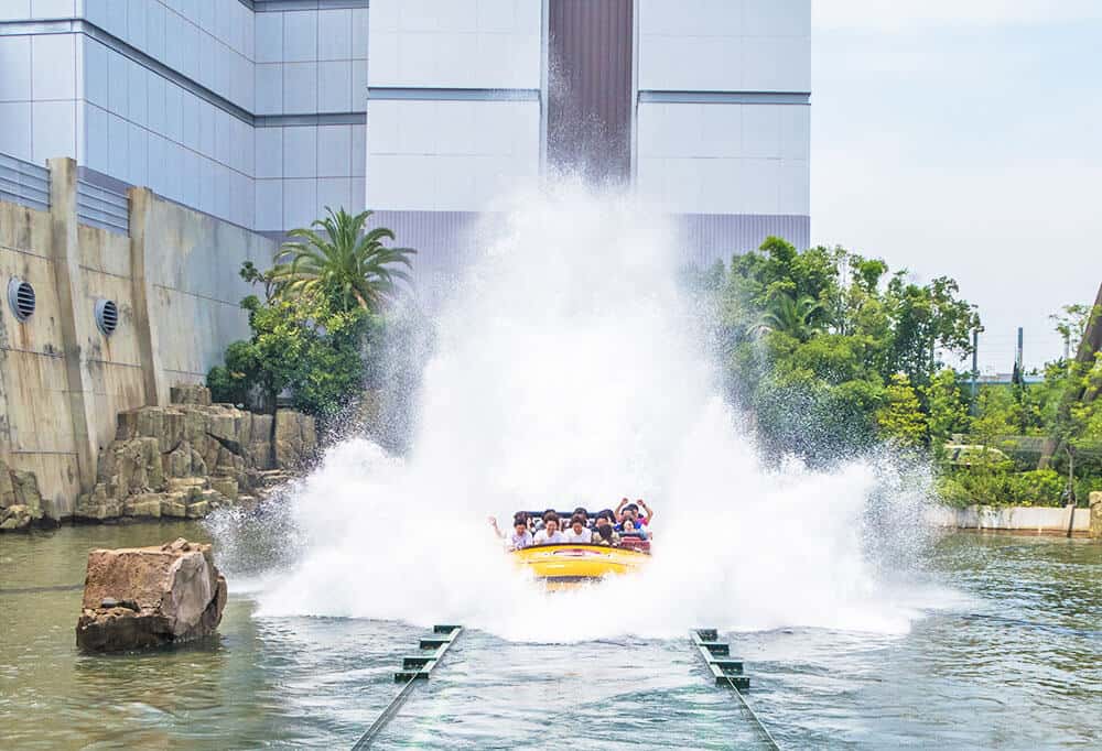 Water splashing on a chart with people inside at a Jurassic World ride, Universal Studios Japan (Osaka)