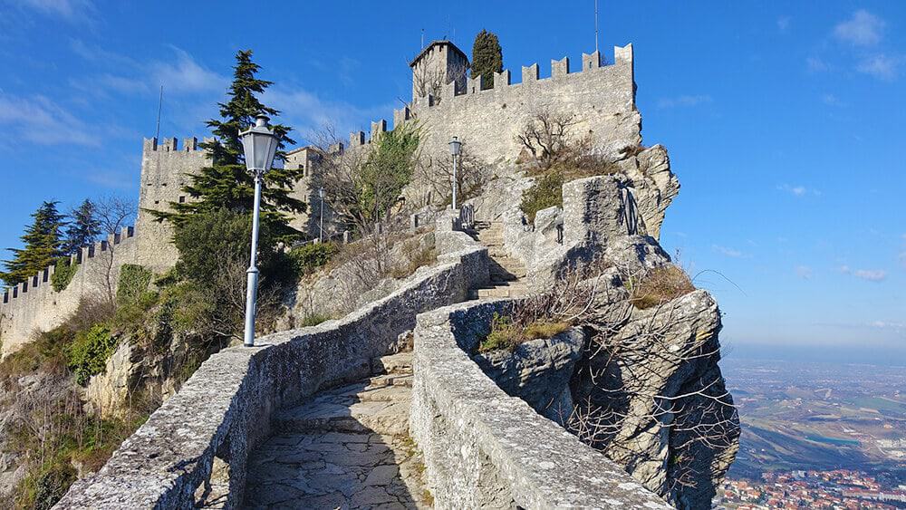 Climbing up to San Marino Castle, the narrow stone stairs