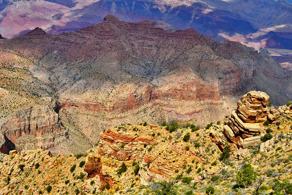 Cloudy day at the Grand Canyon with the sun filtering through the clouds