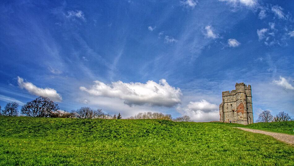 An Irish castle hotel in the middle of the Irish countryside on a sunny day