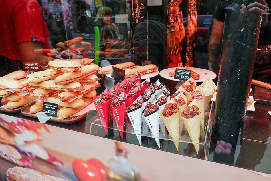 Enrique Tomas paper cones with jamon cubes near the best Soho bars