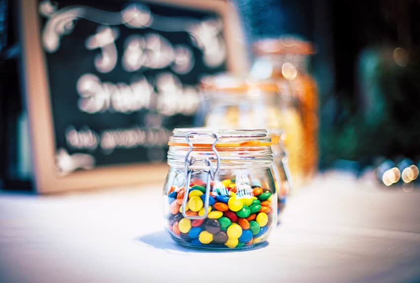 A mason jar with M&M from the M&M World store in London