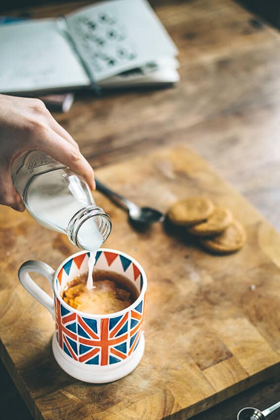 A hand decorated coffee cup with a Union Jack design from London