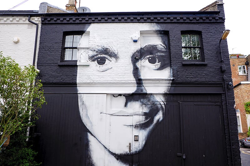 Street art in London in a hidden alley in Notting Hill