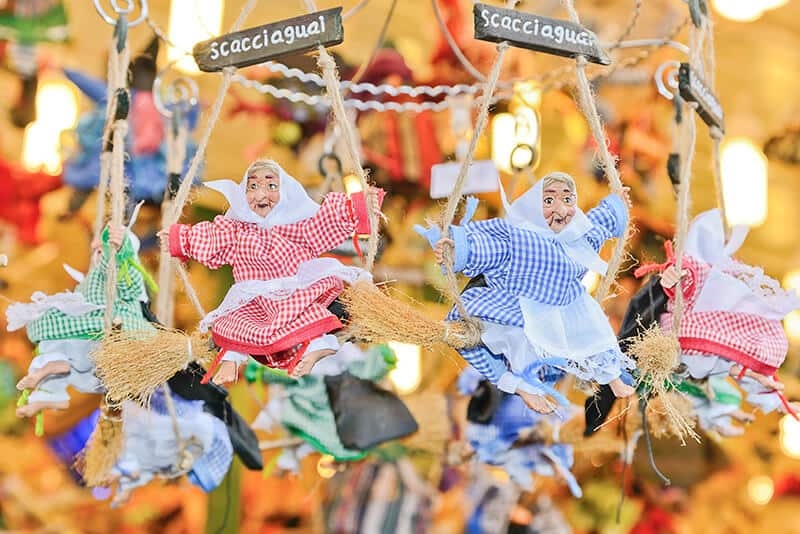 Traditional Italian Befana sold at one of the Christmas markets in Italy