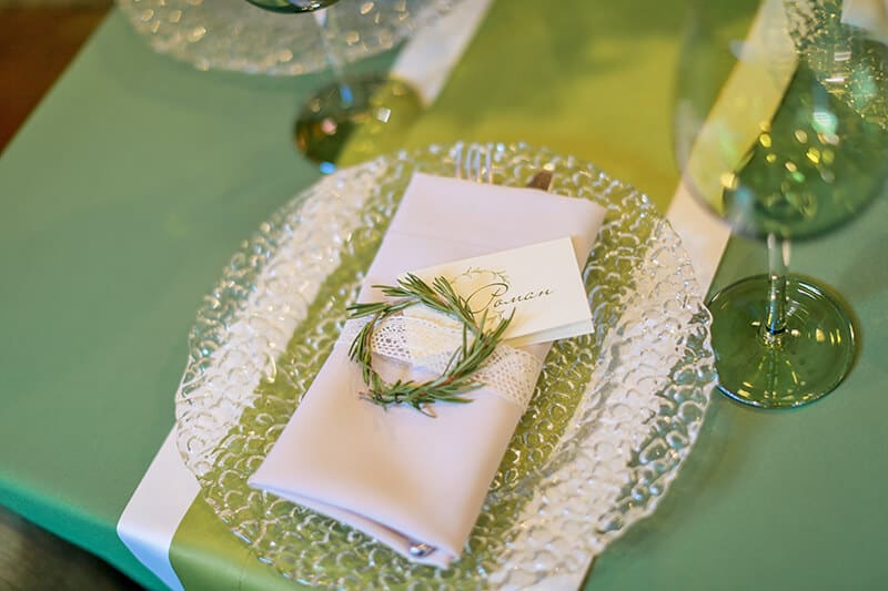 Souvenirs from Ireland on a table: Irish silverware, tablecloth and linens