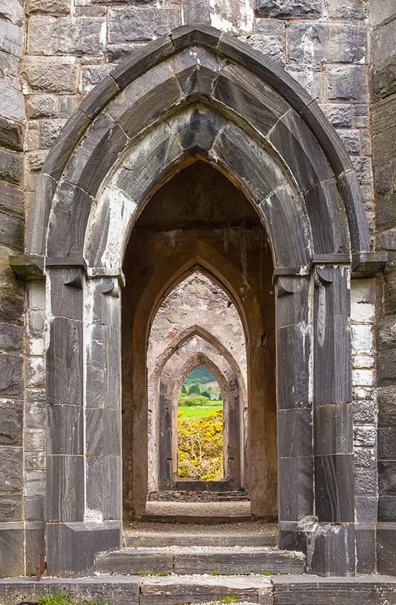 Stone arches with forest on the background  in the Irish countryside