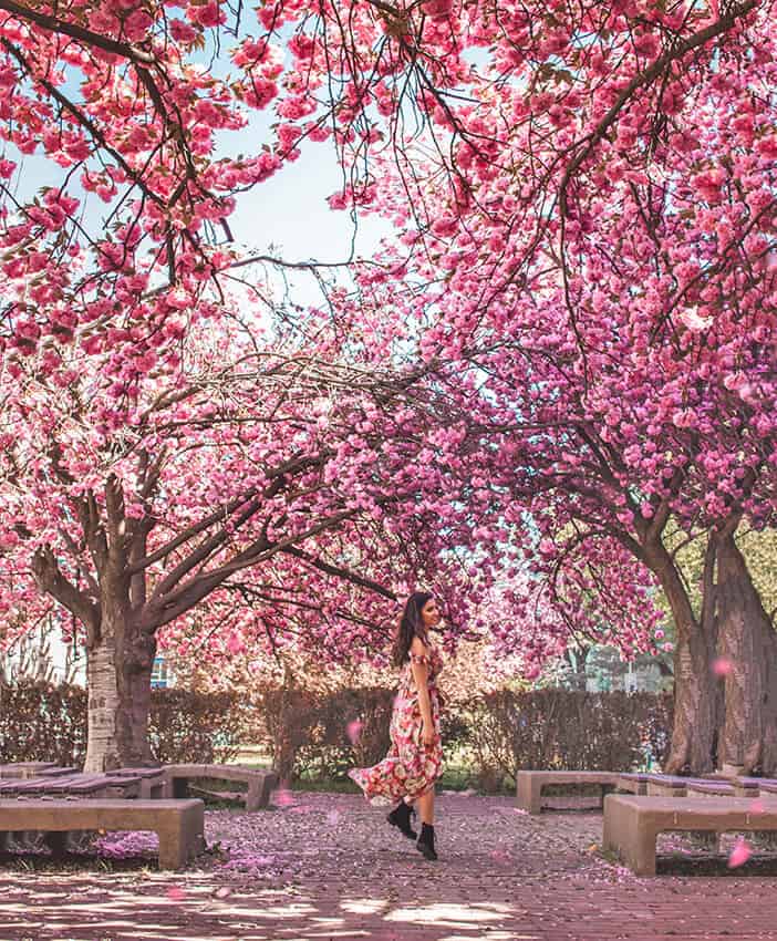 Girl wearing a long maxi dress in spring in London