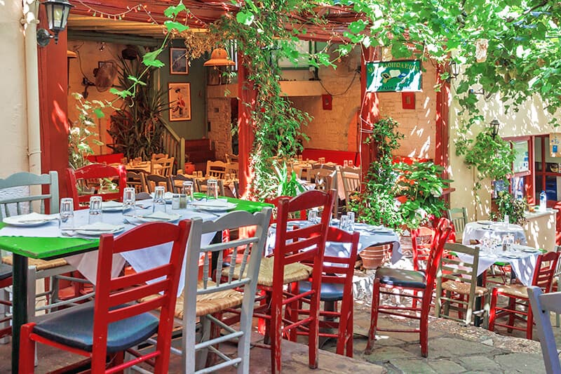 Traditional Italian pizzeria in Rome with the colors of the Italian flag, red, white and green