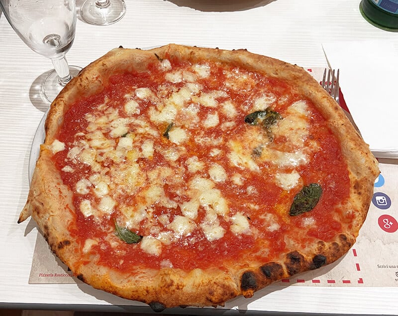 Neapolitan pizza margherita cooked in a pizza oven