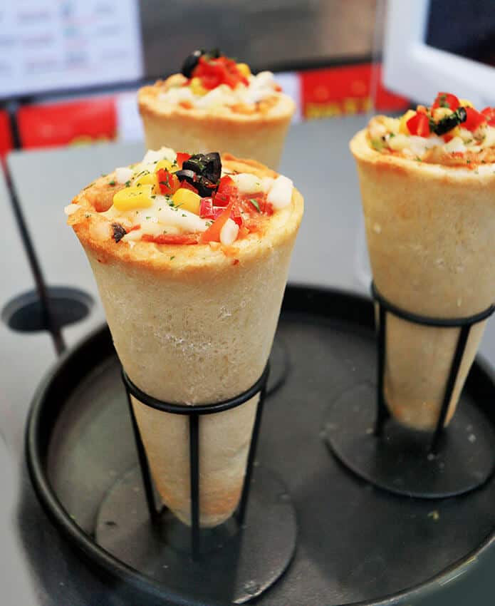 3 Cono Pizza served at a bar in Naples, Italy