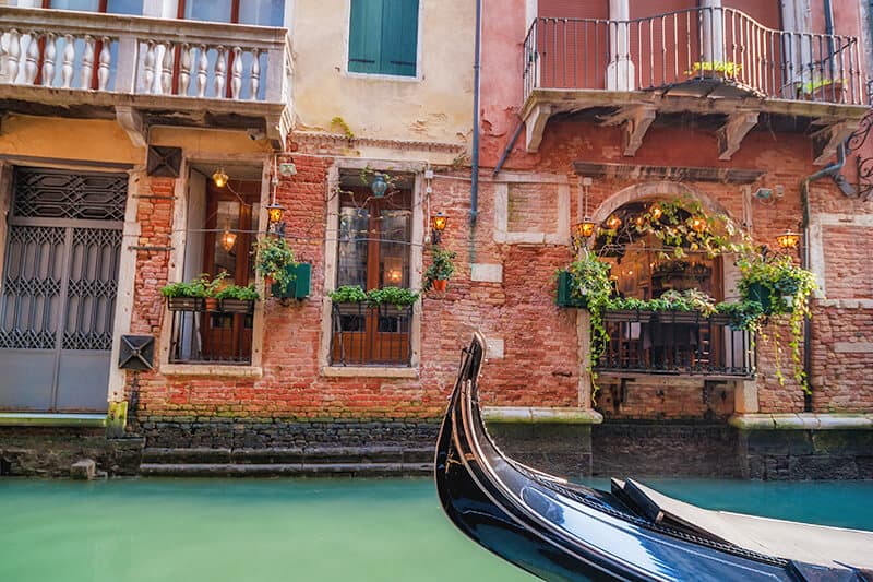 Gondola on a romantic canal ride in Venice (Italy)