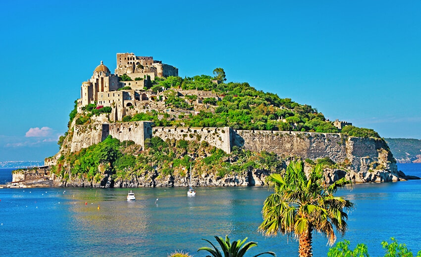 View of Castello Aragonese on an island off the coast of Naples in Italy