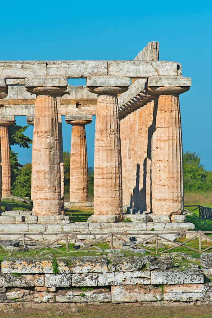 View of one of the massive temples in Paestum, as a day trip from Naples