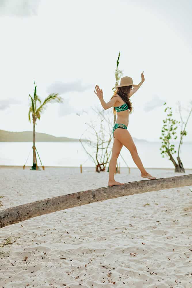 Girl walking on the beach in Miami