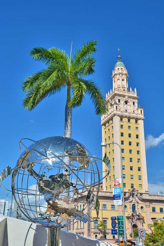 Freedom Tower and a tall Palm in Miami