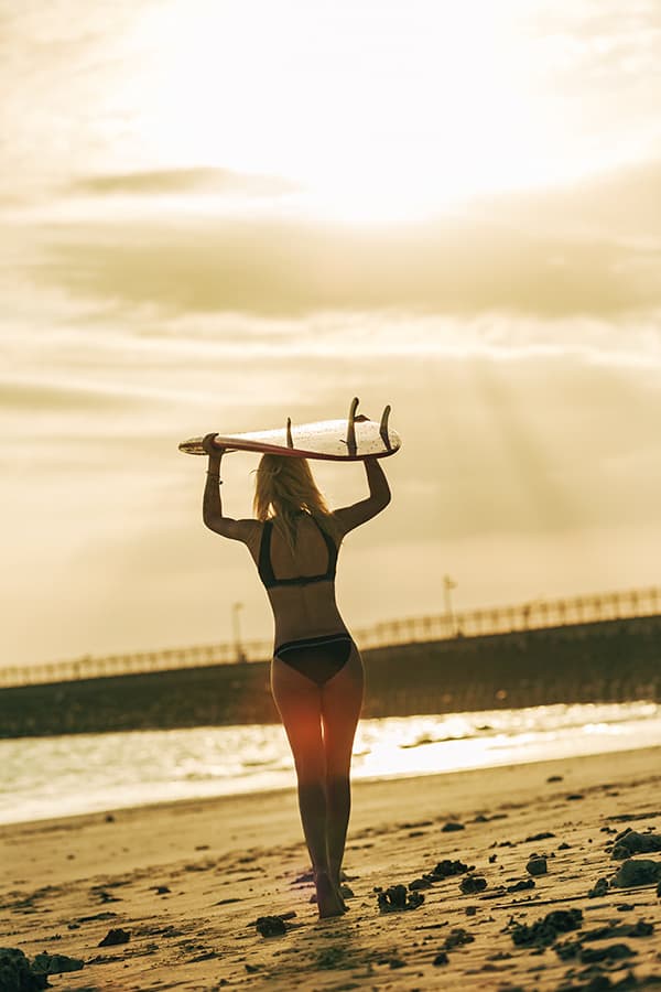 Surfer girl At Sunset Beach (Oahu)