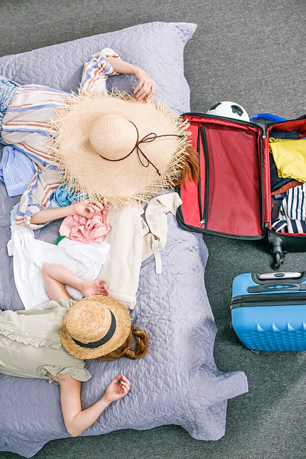 2 Girls packing for Florida