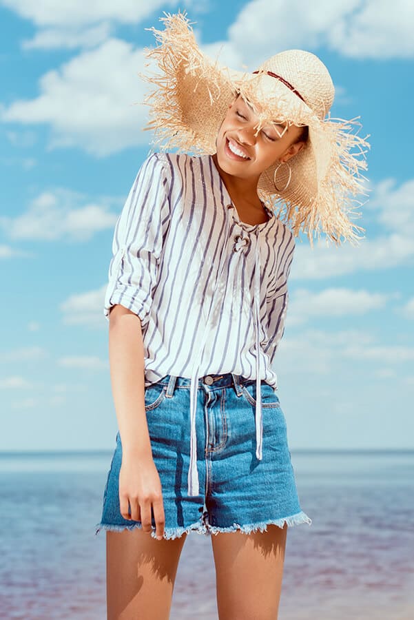 Woman wearing summer clothes at the beach