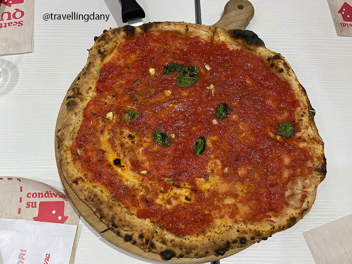 Traditional pizza marinara at a pizzeria