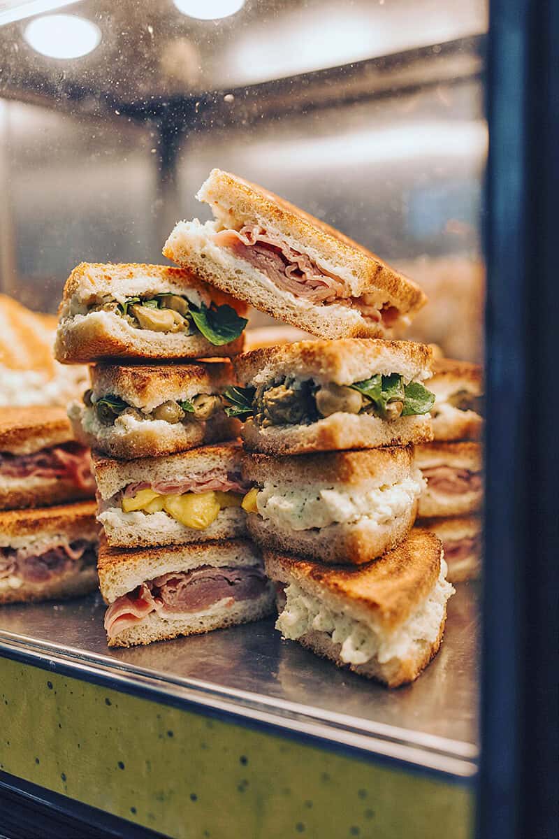 A stack of Italian tramezzini inside a NYC shop